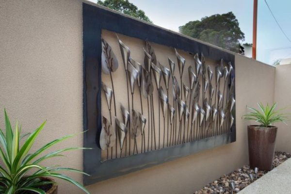 Black metal outdoor wall decor